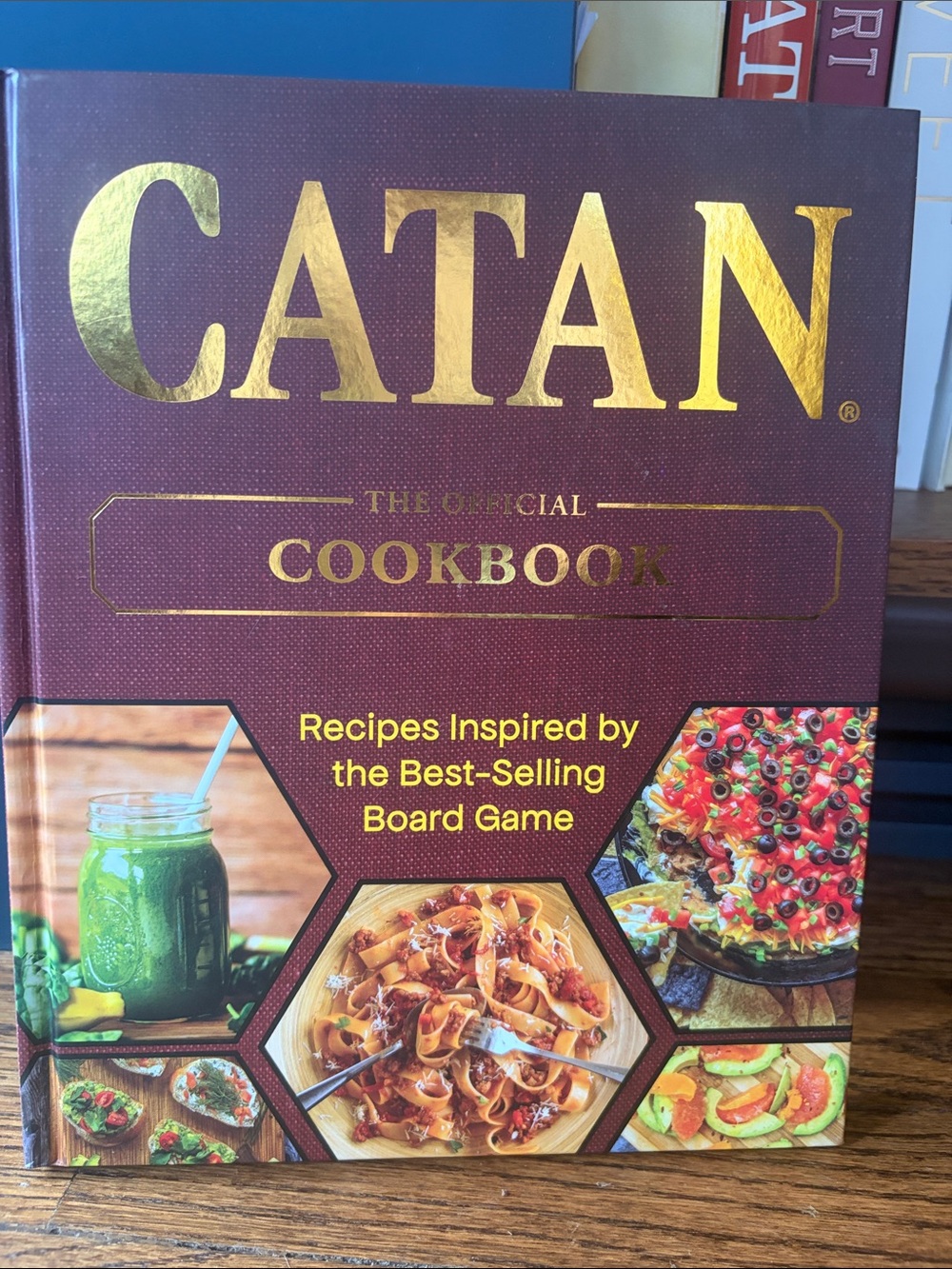 CATAN Official Cookbook - Burgundy & Gold Cover